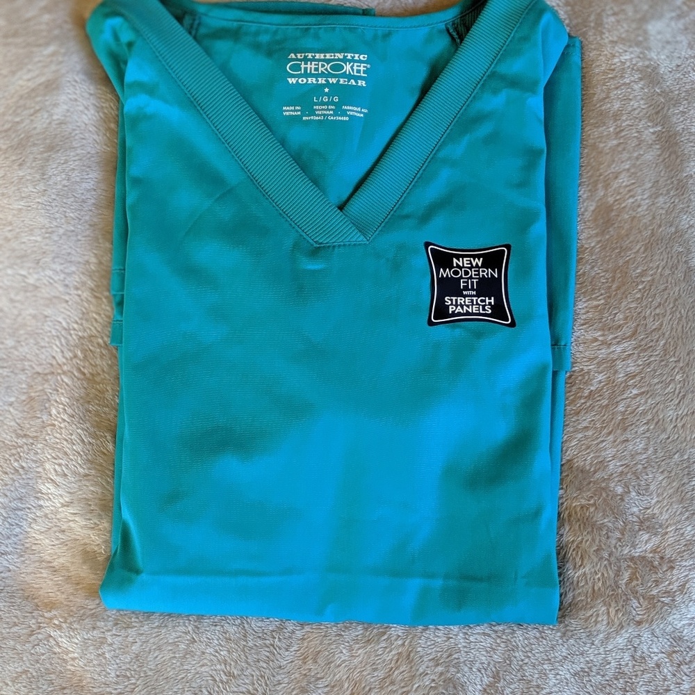 Teal scrub top.